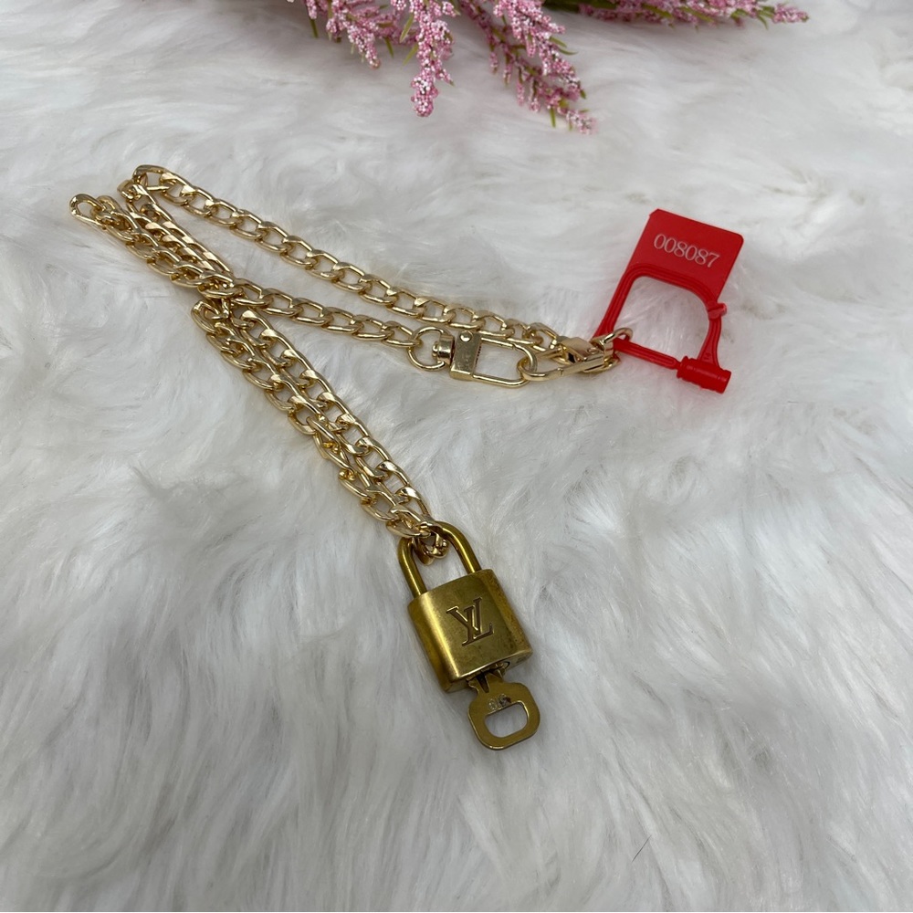 087 Authentic Louis Vuitton  Padlock & Key Gold Tone